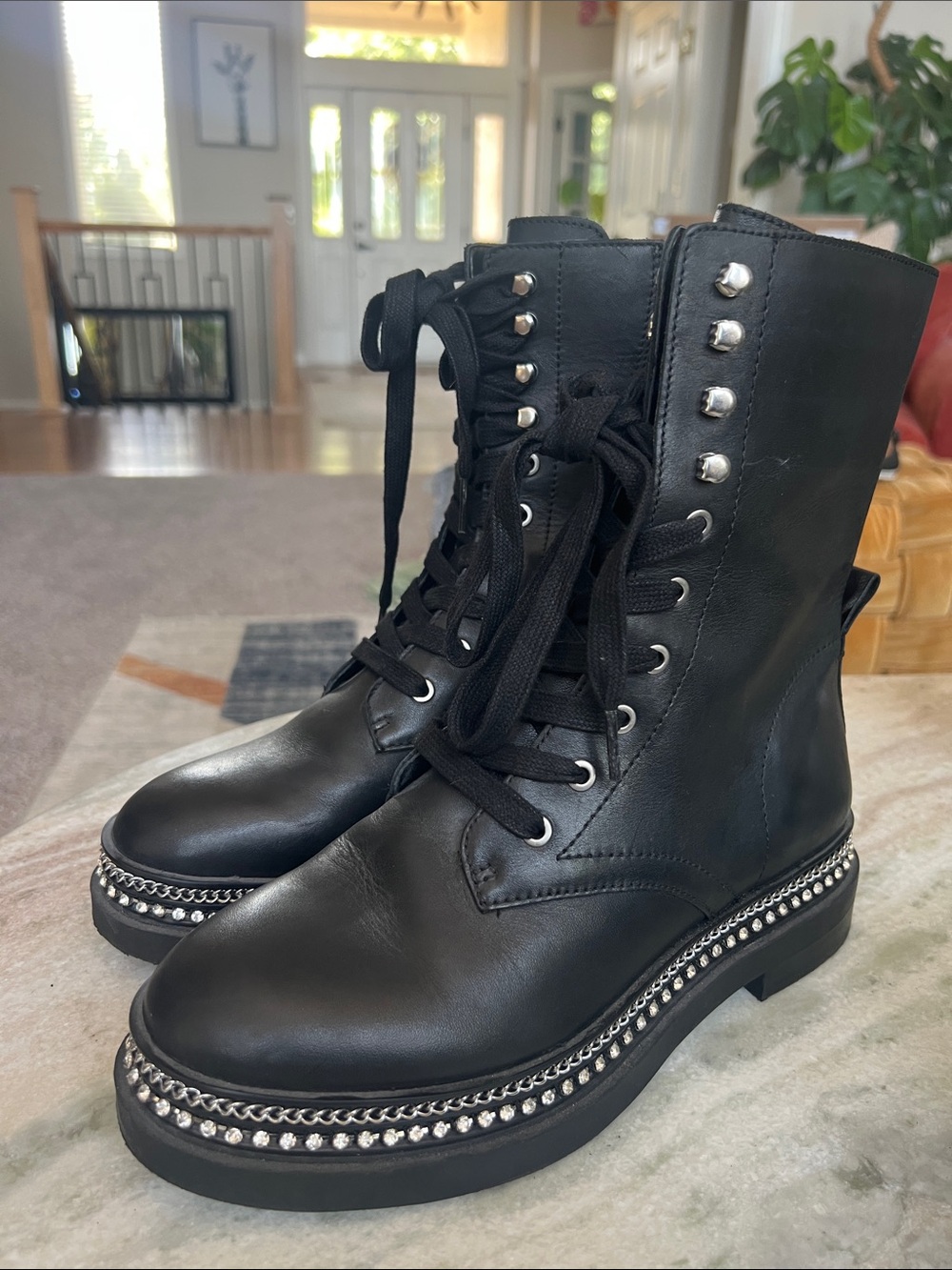 Vince Camuto Branda black leather lace up black leather moto chain combat boot